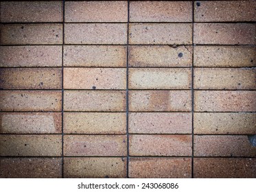 Black background brick wall show damage.