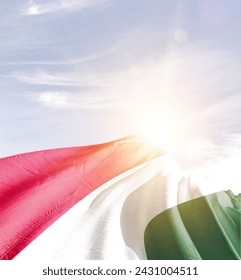 Węgry powiewają flagą w pięknym słońcu.
