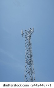 Phone signal transmission tower 4G 5G with clear blue sky background color