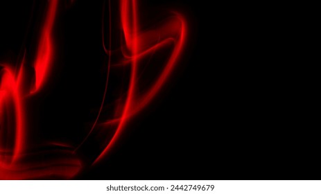Luz roja irregular abstracta sobre fondo negro. Exposición prolongada. Fotografía de pintura luminosa.