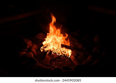 summer camping bonfire at night, Bright flames