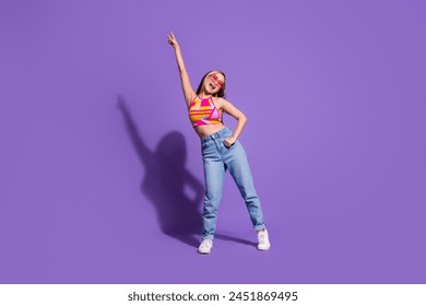 Photo of charming positive glad girl wear stylish clothes dance night club isolated on purple color background