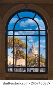 A breathtaking view unveils the awe-inspiring magnificence of Italy's artistry, framing the UNESCO heritage of Rome and the Vatican under the metaphorical embrace of St. Peter's Basilica's dome