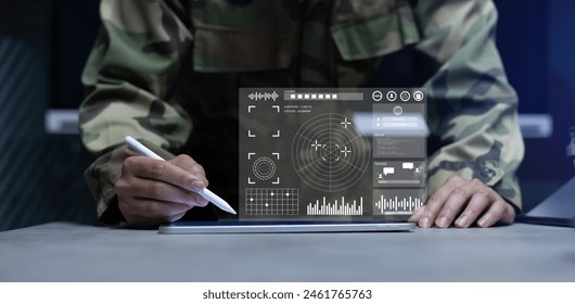 soldier man hand use tablet to use program of radar and radio aviation for test system of tracking and defense at the dark control room center in monitor station for military technology concept