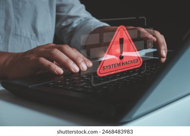 System hacked alert after cyber attack on laptop computer network. compromised information concept. internet virus cyber security and cybercrime. hackers to steal the information is a cybercriminal.