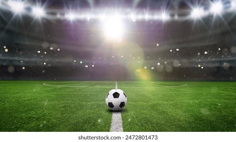Futbol stadyumunda yeşil sahada top. Orta sahada oyuna hazır