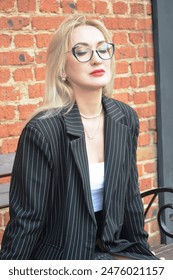 Portrait of a stylish fashionable young girl fashion model