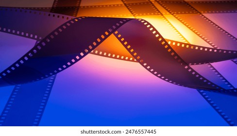 abstract multicolored background with real film strip