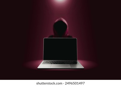Concepto de tecnología de ataque y crimen por parte de piratas informáticos, computadora portátil gris con pantalla en blanco y ataque de piratas informáticos rojos borrosos en un fondo de oscuridad roja con luces que brillan desde arriba.