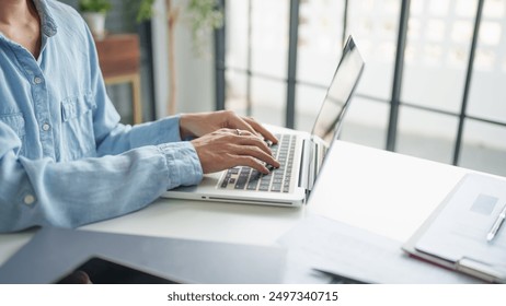 Business man working with laptop Hands typing  keyboard. Professional investor working new start up project. business planning in office. Technology business
