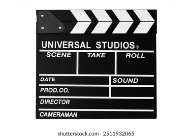 eng Filmkamera op wäissem Hannergrond isoléiert, en Assistent Regisseur Tool, Schéissen, Dubbing