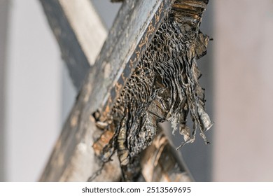 Photo of the texture of black carbon fiber. Carbon dark background of rectangular Black sports film for pasting cars. military carbon fiber. Detail of a crashed military drone carbon fiber honeycombs
