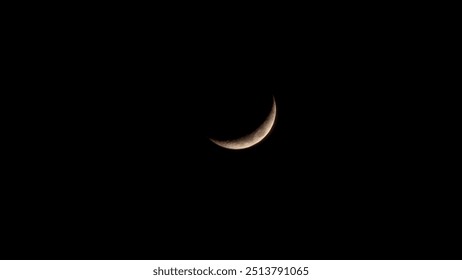 Stunning crescent moon in dark night sky - high contrast astronomy photography