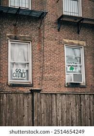 Celtics Fans' Windows in Boston Neighborhood