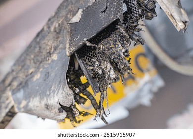 Photo of the texture of black carbon fiber. Carbon dark background of rectangular Black sports film for pasting cars. military carbon fiber. Detail of a crashed military drone carbon fiber honeycombs