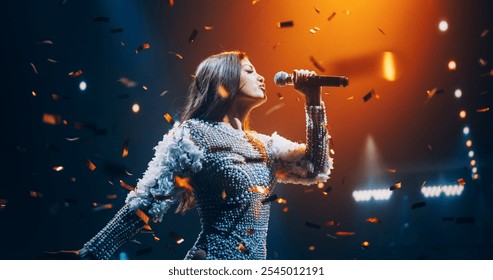 Portrait of a Female Artist Passionately Performing an Emotional Song on Stage. Musician Wearing a Creative Outfit, Holding a Microphone, Glittering Confetti Falling Down, Reflecting Dramatic Lights