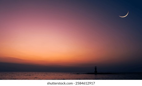 Crescent moon on dusk sky twilight over sea after sun dawn well free space for religion arabic text Ramadan Kareem, Eid Mubarak, Eid Al Fitr, Eid Al Adha