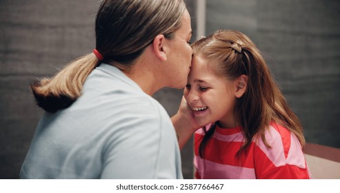 Mother, child and kiss on forehead in home for love, support and daughter bonding together with parent. Mom, girl and affection with kid for care, connection and happiness with family for motherhood