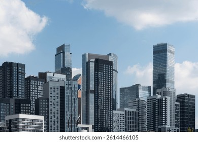 Moscow City Business Center . A complex of modern high-rise residential buildings against the background of the business center of the metropolis .
