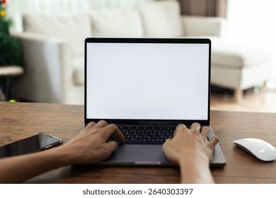 mock up businessman working empty screen computer on wood desk in home. Notebook Laptop with blank screen