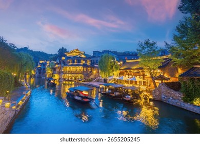 Cityscape of Gubei water town near Beijing in China at twilight
