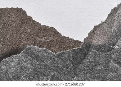 Straturi abstracte de hârtie ruptă creând un peisaj texturat în nuanțe monocrome pe fundal alb.