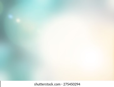 Blur background with nature glowing sun light flare and bokeh in cyan turquoise and warm yellow color 