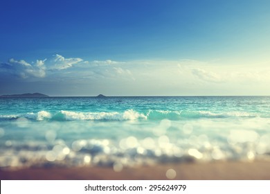 strand in zonsondergangtijd, tilt shift zacht effect