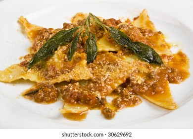 Italian ravioli versel'ez by a sauce and greenery