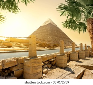 Pyramid of Khafre and asphalted road with columns