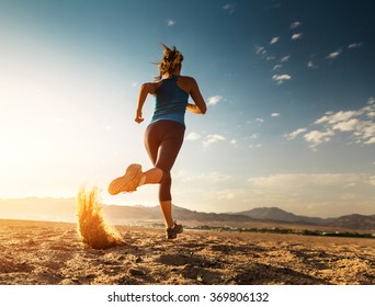 Lady running in the desert