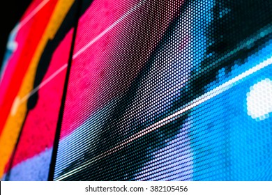 Bright colored blue LED wall with pink pattern - close up background