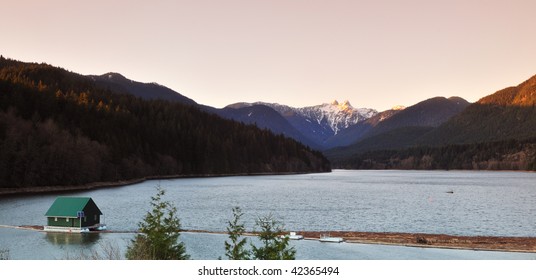 Capilano River and the lions mountain at sunset in winter