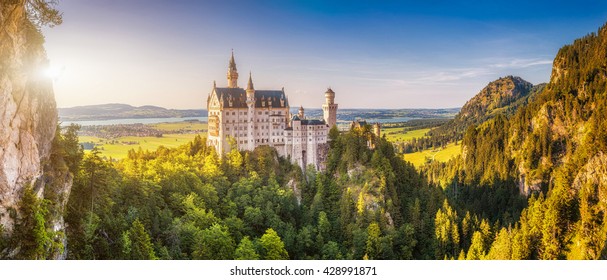 Beautiful view of world-famous Neuschwanstein Castle, the 19th century Romanesque Revival palace built for King Ludwig II, in beautiful evening light at sunset, Fussen, southwest Bavaria, Germany
