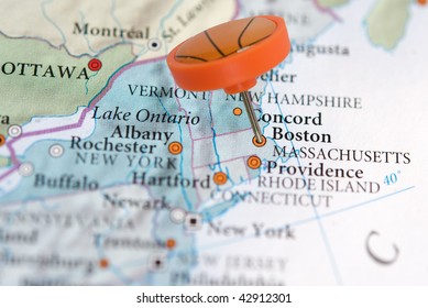 Close up of Boston on a map with a basketball pin.