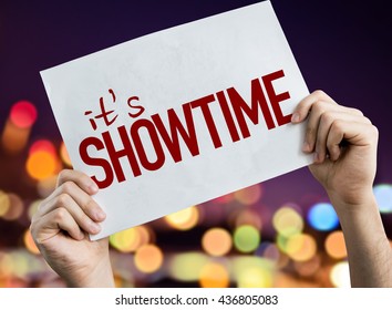 Its Showtime placard with night lights on background