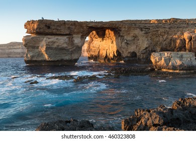 Limestone arch, at sunset know as the Azure Window, in Dwerja, Gozo, Malta.This location was used as a wedding scene in Game of Thrones, as Daenerys Targaryen marries the Dothraki warlord Khal Drogo.