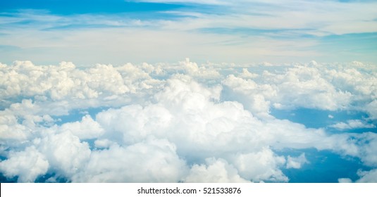 Beautiful natural cloudscape and sky Aerial view of Blue sky and top Cloud view or cloudy of bird eye view from airplane window.