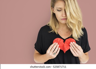Girl Holding Broken Heart Concept