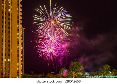 Colorful firework over Honolulu skyline Hawaii. View from the hotel.