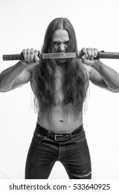 black-and-white portrait of a brutal man bodybuilder with bare-chested with long hair with a Japanese sword on a white background