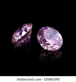 Pink Color Brilliant Cut Gems on a Black Background.
