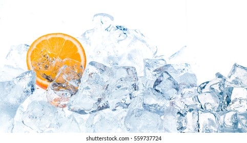 Fresh orange in ice cubes background.
