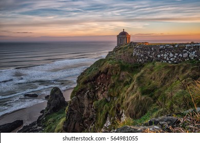 Mussenden Temple is a small circular building located on cliffs near Castlerock in County Londonderry, high above the Atlantic Ocean on the north-western coast of Northern Ireland