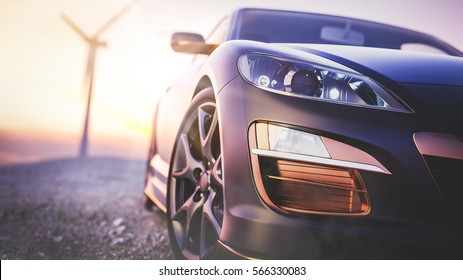 La imagen frente a la escena del automóvil deportivo detrás mientras el sol se pone con turbinas eólicas en la parte posterior.