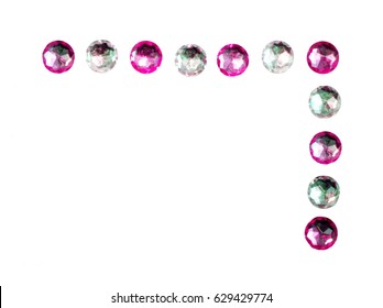 Pink and silver glittery gems corner decoration empty white background