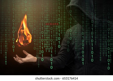 Hacker show a fireball on his hand with green digital binary in foreground. Fireball Adware Infects a Quarter Billion PCs designed to hijack browsers to change the default search engine.