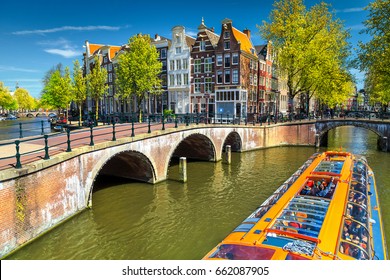 Stunning Amsterdam canals and typical dutch houses in capital of Netherlands, Europe