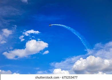 jet in the sky leaves contrail at the airshow