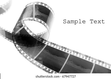 Alter Negativfilmstreifen mit leicht entfernbarem Text.